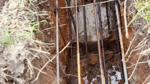 Iron mesh reinforcement Foundation for the construction of the cottage Video stock 90399233