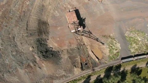 Iron mining with a large excavator. Development of a mineral deposit. The mo Stock Footage 165101501