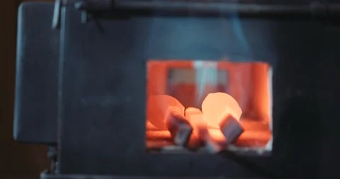 Iron nails being heated in a forge Stock Footage 105294868