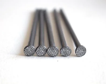 Iron nails on a white background Stock Photos
