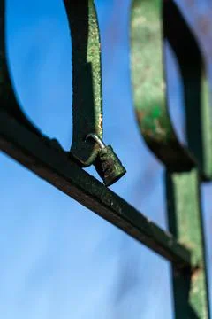 Iron, old handrails with a lock on them. Love lock on the railing Stock Photos