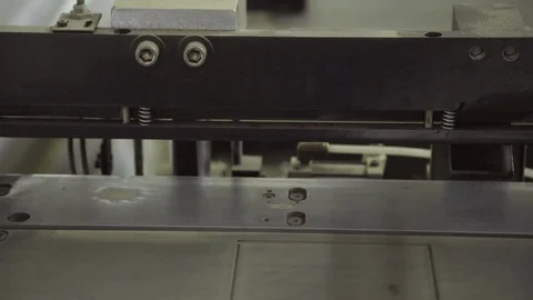 Iron old machine cutting sheets for binding newspapers Stock Footage 71312504