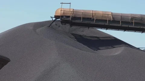 Iron pellets transshipment in dock Stock Footage 90898586