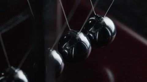 Iron pendulum swinging balls close-up Stock Footage 67319293