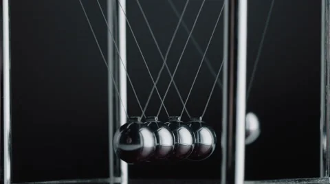 Iron pendulum swinging balls close-up Stock Footage 67319390