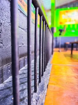 Iron pillar at the edge of the cafe Stock Photos