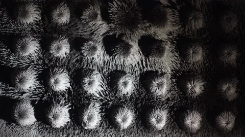 Iron powder dancing in strong electro magnetic field. Video stock 164840331