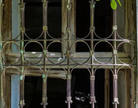 Iron railing of an old window without welding Stock Photos