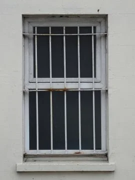 Iron Security Bars On Window Stock Photos