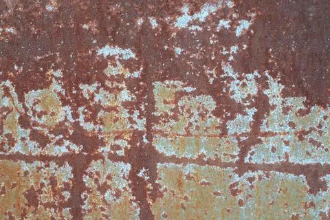 Iron sheet texture. Weathered and oxidized rusty iron sheet with peeling pa.. Stock Photos