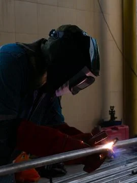 Iron soldering, Man working on iron soldering, welding sparks Stock Photos