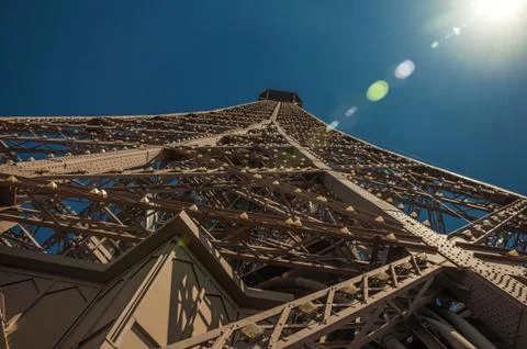 Iron structure from the Eiffel Tower with sunlight in Paris 写真素材
