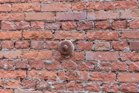 Iron support on brick wall Stock Photos