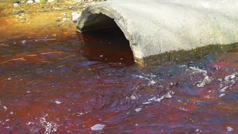 An iron-tainted, red stream. Stock Footage 346035706