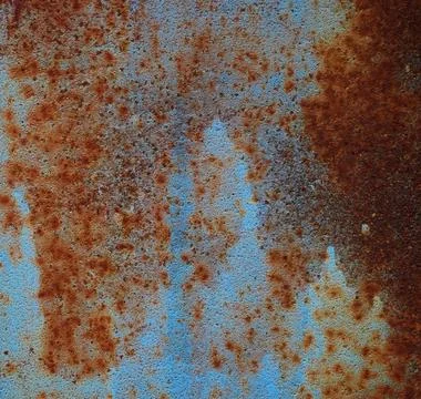 Iron texture of rusty sheet with remains of blue paint. Metal rusty textur... Stock Photos