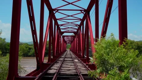 Iron Train Bridge View with Vanishing Point Over River Stock Footage 293387361
