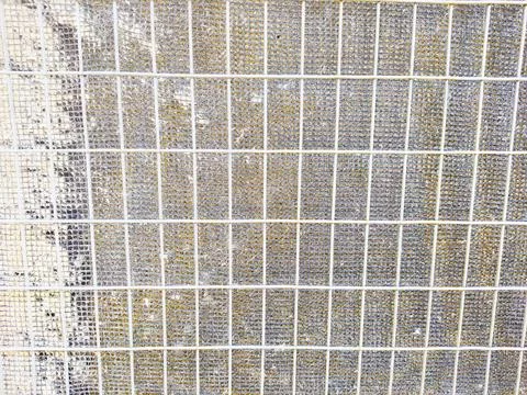 Iron wire mesh that forms a unique background Stock Photos