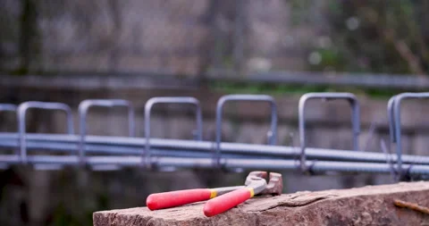 Iron wire reinforcement of concrete work. Construction site objects of bending c Stock Footage 288789352