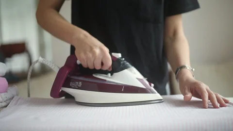 Ironing clothes Stock Footage 97991211