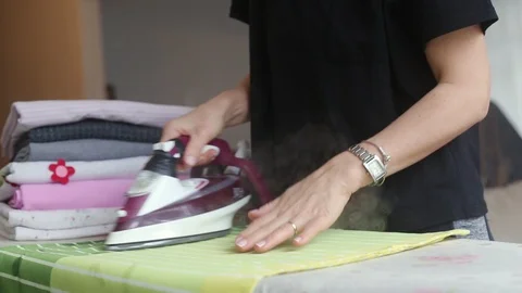 Ironing clothes Stock Footage 97997767