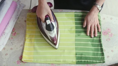 Ironing clothes Stock Footage 97998271
