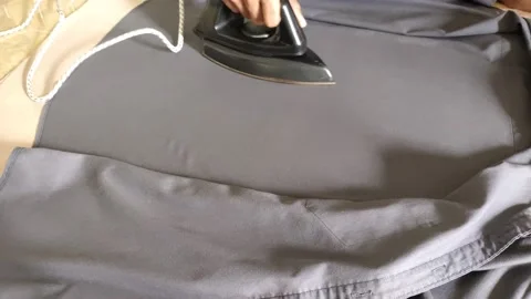 Ironing clothes Video stock 150135938