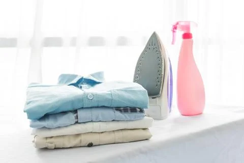 Ironing, clothes, housework and objects concept Stock Photos