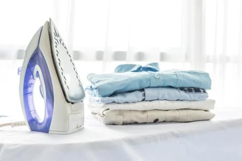Ironing, clothes, housework and objects concept Stock Photos