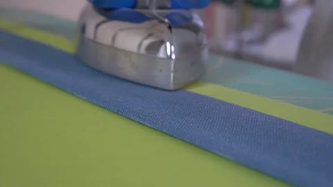 Ironing Fabric Mastering Techniques for Crisp and Immaculate Finishes to Enhance Stock Footage 310248967