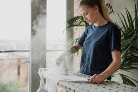 Ironing the Laundry 스톡 사진