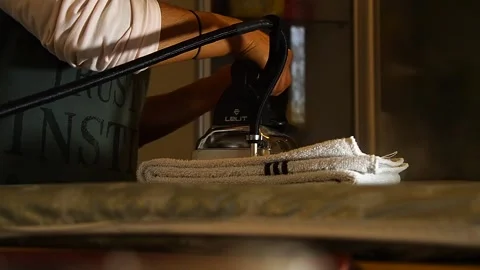 Ironing the linen Stock Footage 257560199