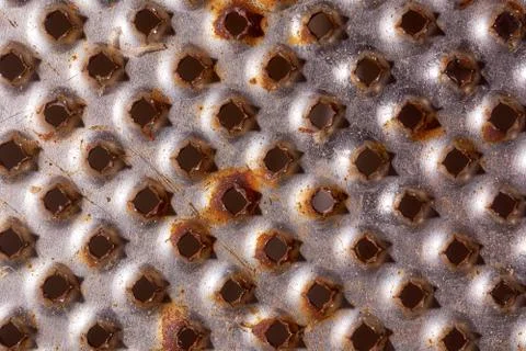 Iron's background rusty grater. Close-up. Macro effect photo Stock Photos