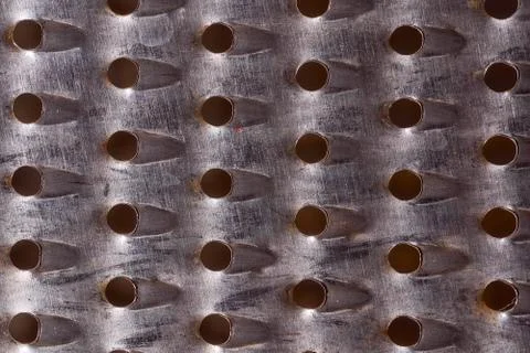 Iron's background rusty grater. Close-up. Macro effect photo Stock Photos