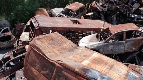Irpin, Bucha district, Ukraine: a dump of shot and burned cars Stock Footage 198210930