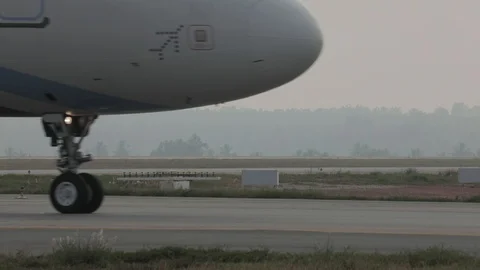 Irplane Wheel Rotation, Closeup Stock Footage 100138016
