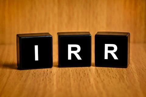 IRR or internal rate of return word on black block Stock Photos