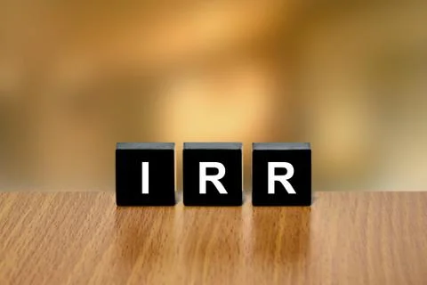 IRR or Internal Rate Of Return on black block Stock Photos