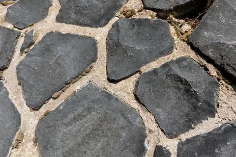 Irregular coursed masonry texture, rustic natural quarry stone wall Фото