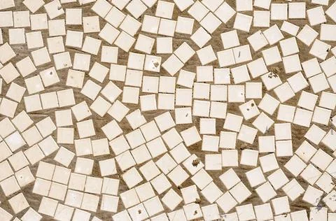 Irregular Mosaic Texture An irregular mosaic texture wall with white tiles... 스톡 사진