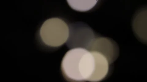 Irregular movements of bright lights pointing upwards golden light 스톡 동영상 317489769