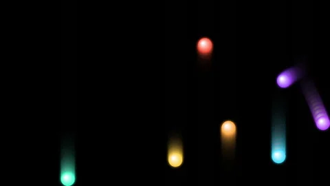Irregular movements of colored balls in the dark Stock Footage 321013349