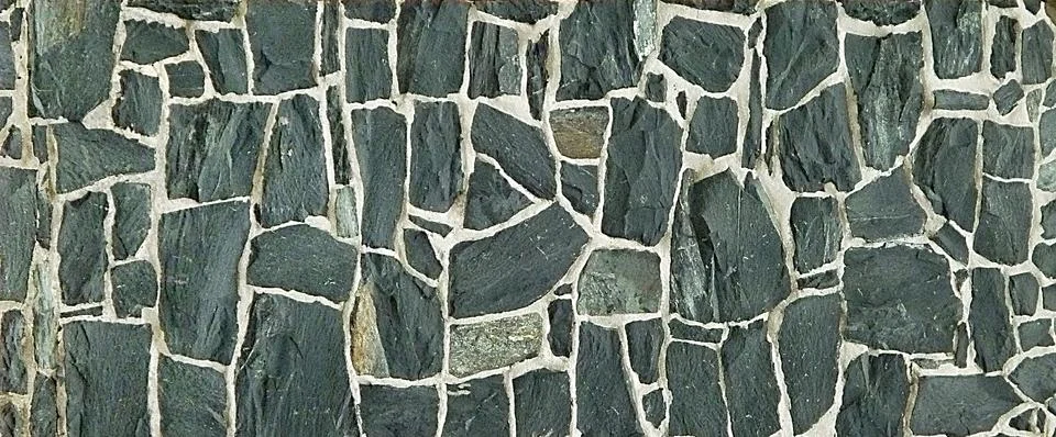 Irregular stones wall texture Stock Photos