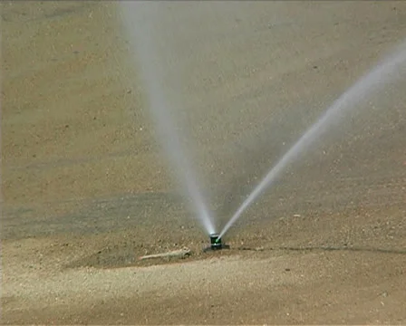 Irrigating a golf course Stock Footage 25888144