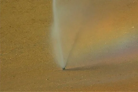 Irrigating a golf course Stock Footage 25914315