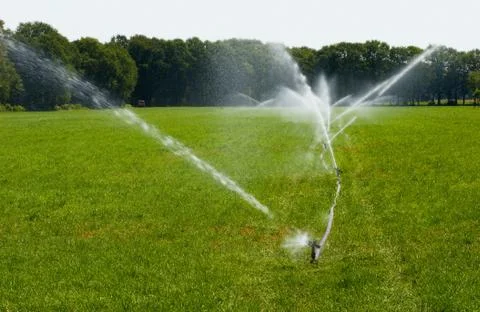 Irrigating grassland Stock Photos