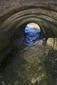 Irrigation ditch between fields Stock Photos