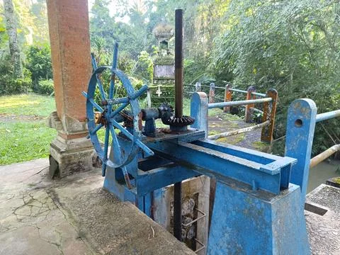 An irrigation sluice gate located on a small dam. Fotos de archivo