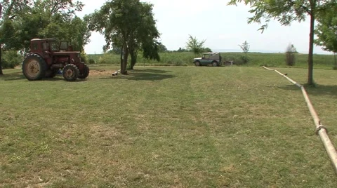 Irrigation of soybean with the tractor on the left Stock Footage 41132878