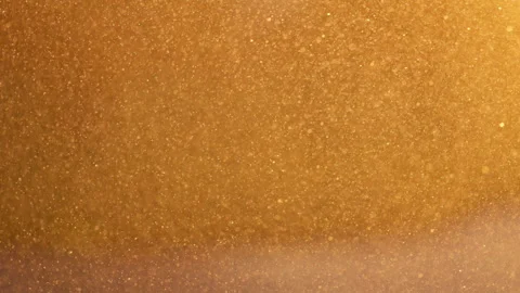 Irrigation. Splashing drops of water on the background of sunset. Abstract Stock Footage 237498955