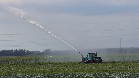 Irrigation system on agricultural land. Stock Footage